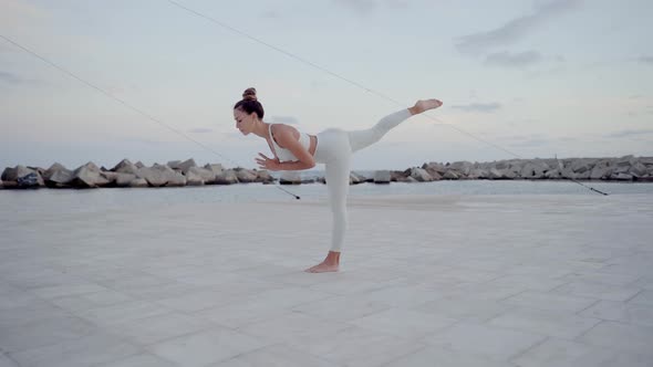 Female Doing a Warrior Yoga Pose