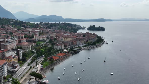 Drone Flying over Beautiful Sail boats in Southern Corner Lake Lago Maggiore