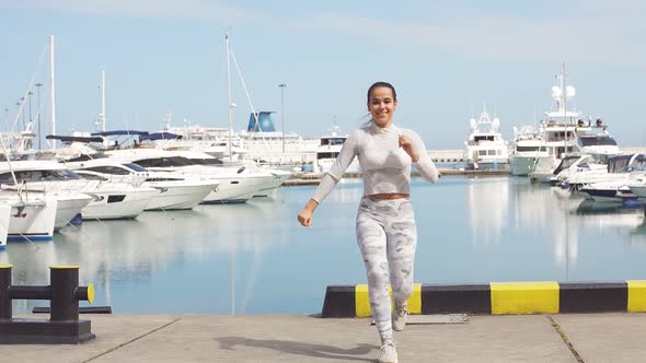 Women Doing Squats Training Outdoors Showing Power and Strength.