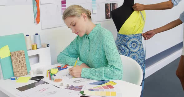 Young women working in a creative office