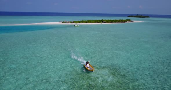 Wide birds eye abstract shot of a summer white paradise sand beach and aqua turquoise water backgrou