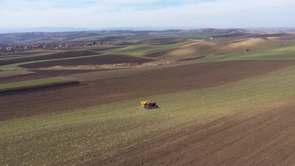 Combine Working on Agricultural Field