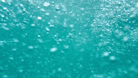 Strong Undertow with Air Bubble Floating in Sea Water