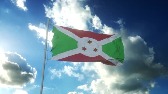 Flag of Burundi Waving at Wind Against Beautiful Blue Sky