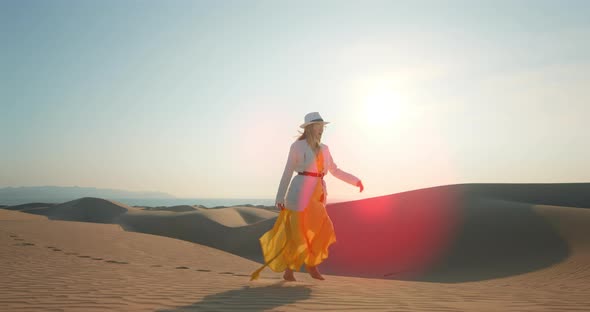 Slow Motion  Beautiful Model Dancing and Walking By Sand Dunes  Slow Motion