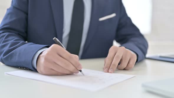 Businessman Writing Letter