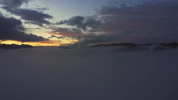 Drone Flying Over Clouds And Fog In Zakopane Near Tatra Mountains At Sunset In Poland. - aerial