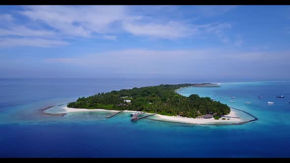 Aerial flying over sky of exotic sea view beach holiday by blue green sea with white sand background