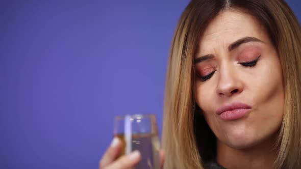 Closeup Beautiful Blonde Caucasian Woman Holding Glass of Champagne