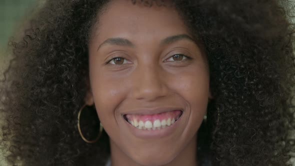 Close Up of African Woman Smiling at Camera