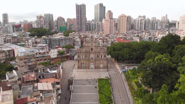 Aerial view approaching famous Ruins of Saint Paul's, Macau. Downwards tilt