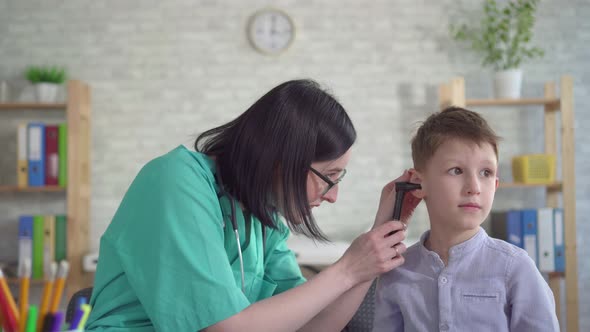 Little Boy at a Doctor's Otolaryngologist