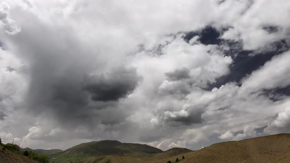 A Little Rain Pass Over Arid Hills