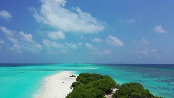 Aerial tourism of beautiful seashore beach journey by blue green water with white sand background of