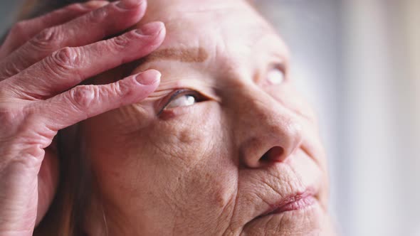 Portrait of Lonely Old Woman Thinking About Life