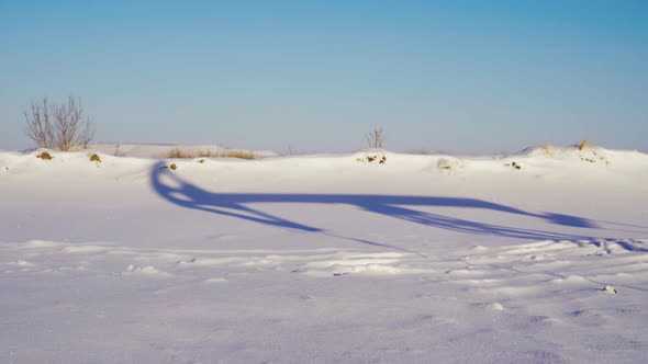 Shadow Oil Pumps on a Winter Sunny and Frosty Day