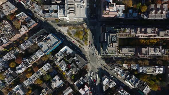 Aerial Birds Eye Overhead Top Down Footage of Traffic in Streets on Residential Urban Borough in