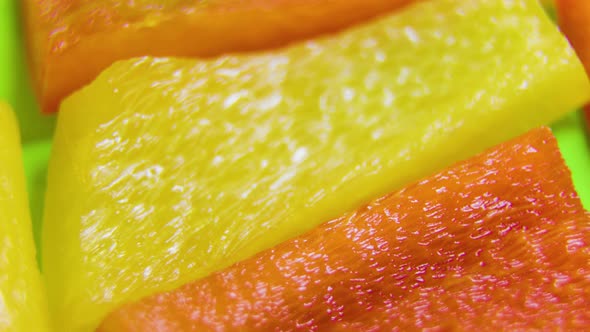 Yellow Red Orange Bell Pepper Slices Rotating