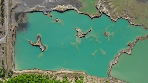 Drone View of the Turquoise Lake Formed As a Result of Mining Waste