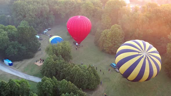 Beautiful top view of the balloons. Balloons fly over the park.