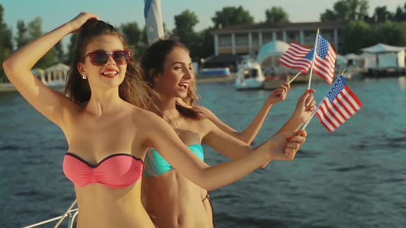 Girls Resting on the Sea. American Girls.  