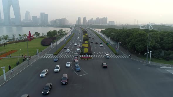 Aerial Drone Shot of Crossroad in the City Cars and Buses Driving By Avenue