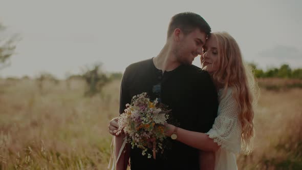 Portrait of Affectionate Happy Loving Couple Walking and Embracing