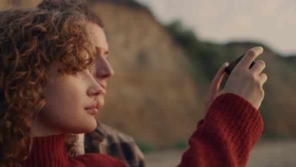 Relaxed Locers Taking Photo on Smartphone Sunrise Beach