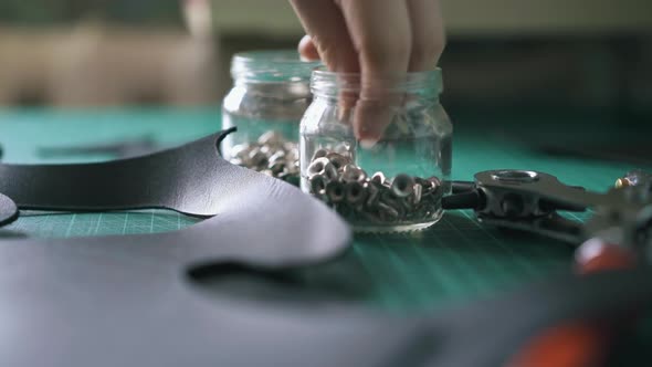 Skilled Tailor Takes Hollow Nails Hat Rivets and Puts