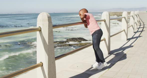 Video of african american boy looking at sea