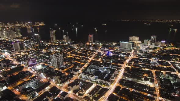 Timelapse of Georgetown city at night with traffic.