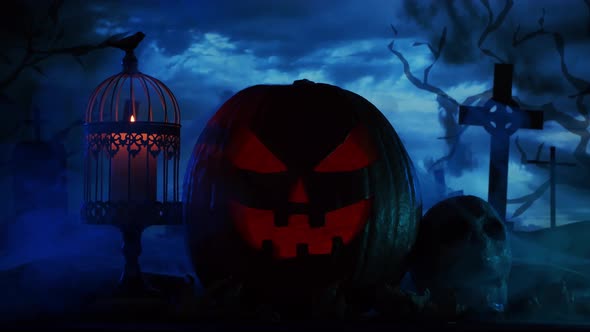 Scary laughing pumpkin and an old skull over the frightening gothic background.