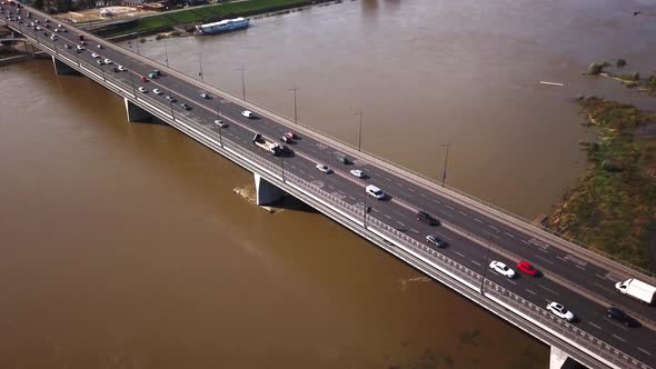 Aerial top down view shot of traffic jam on a car bridge in the evening rush hour