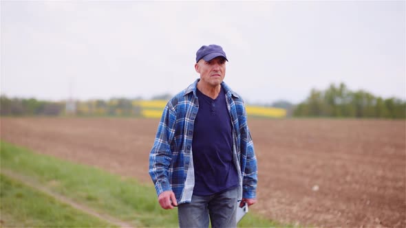 Extremely Angry Farmer In Field