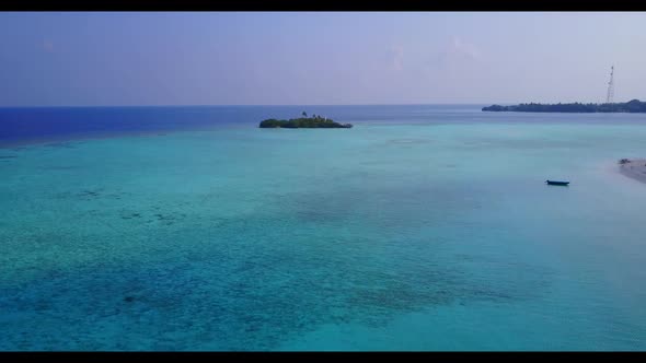 Aerial drone landscape of exotic resort beach vacation by blue ocean with white sandy background of 