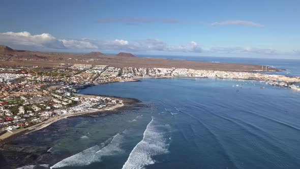 Aerial View of Waves Crashing on the Bay of Corralejo, Fuerteventura