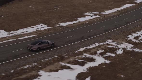 Car in the Mountains of the Caucasus in Winter