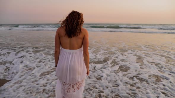 Beautiful Woman Enjoying The Beach