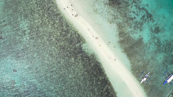 Beautiful Sandbar Connecting Snake Island in the Bacuit Bay, Near the of El Nido in Palawan