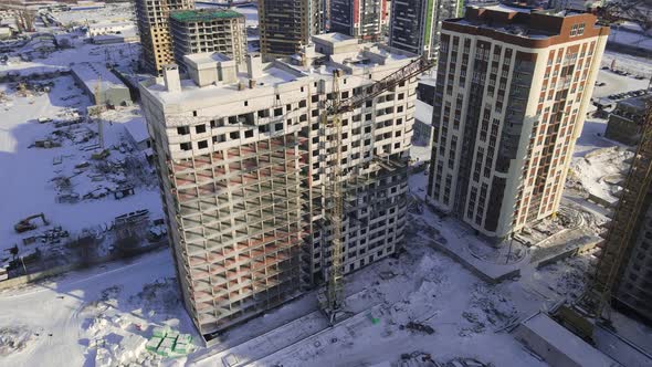 Aerial view to the construction works on the top of building