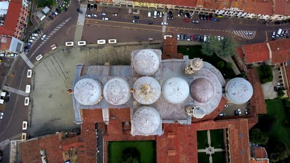 The Basilica of St. Anthony in Padua Italy is seen from above with its many domes, Aerial drone top