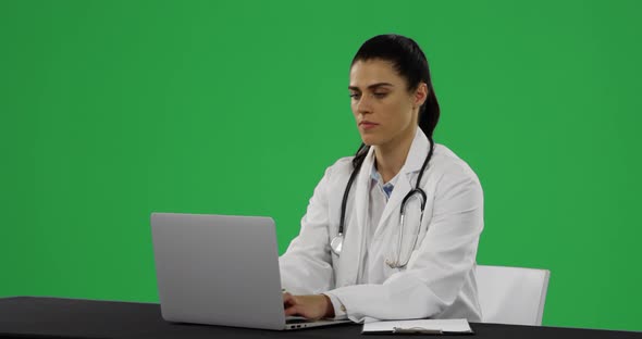 Young doctor in a lab coat