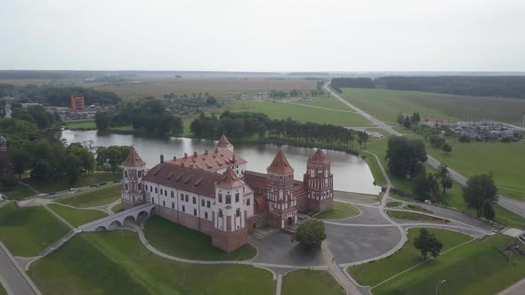 Aerial Circular Shot From Above Mir Castle in Belarus. Stunning Top View of an Old Building with