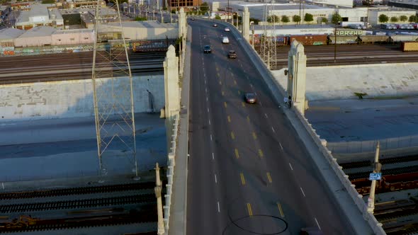 Commuting Concept - Cars Driving on 4th Street Bridge in Los Angeles City. Aerial Drone Flyover