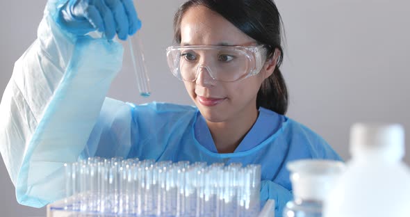 Woman scientist doing research in laboratory