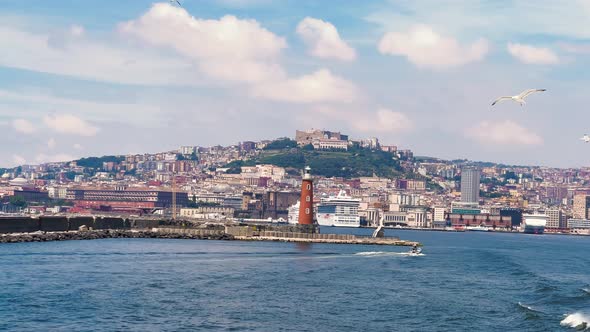 Naples Coastline and Cityscape From a Moving Boat in the Sea in Summer Season