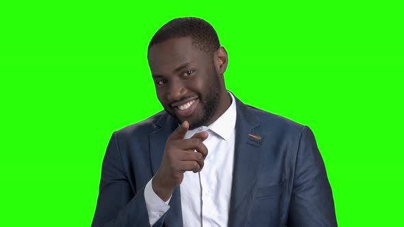 Flirtatious Dark-skinned Man on Green Screen.