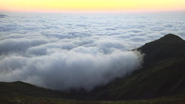 Twilight Before Sunrise Over the Clouds Landscape From Mountain Summit