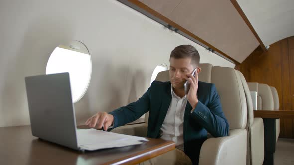 Business Man Talking By Mobile Phone Partner Connection Aircraft Jet Travel
