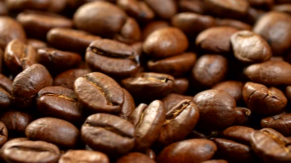 Coffee Beans Background. Close-up of a Rotating Panel, Filled with Brown Roasted Appetizing Coffee